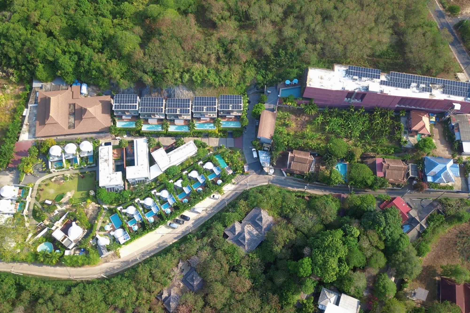 Le Resort And Villas Rawai Экстерьер фото Aerial view of the village