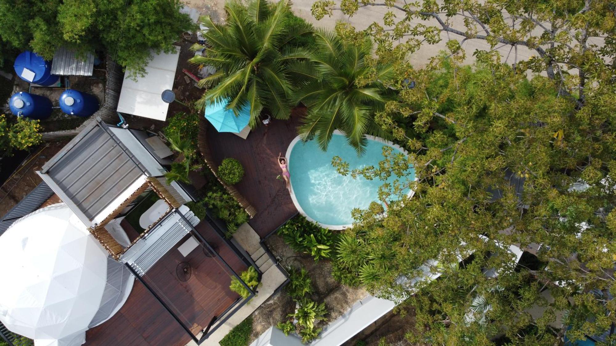 Le Resort And Villas Rawai Экстерьер фото Aerial view of the pool at the hotel